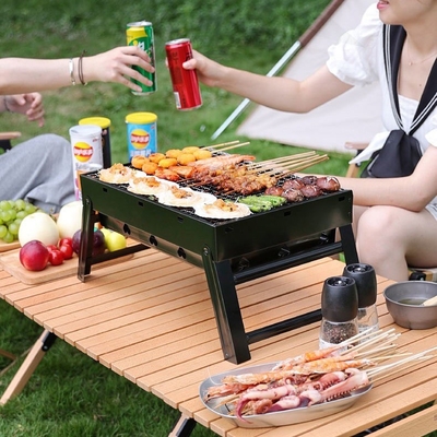 Cắm trại ngoài trời bằng than nướng BBQ